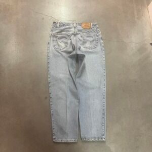 Vintage levis 560 light wash men's blue jeans pleat loose fit 1998